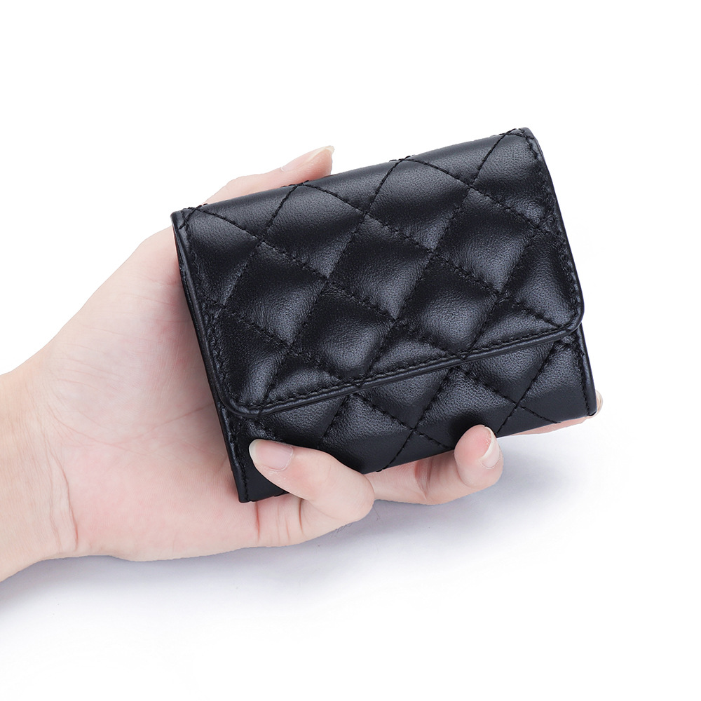 Tarjetero acolchado de piel de - Luxury Bags Names reseña y precio